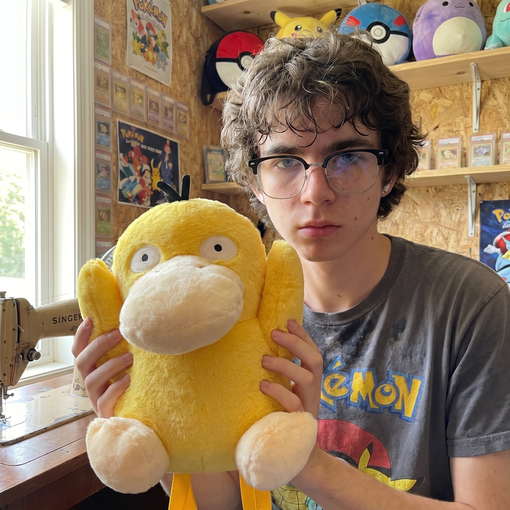 Psyduck plush bag held in hands