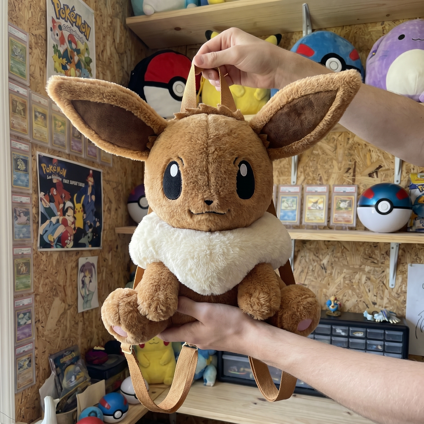 Eevee plush backpack held in hands